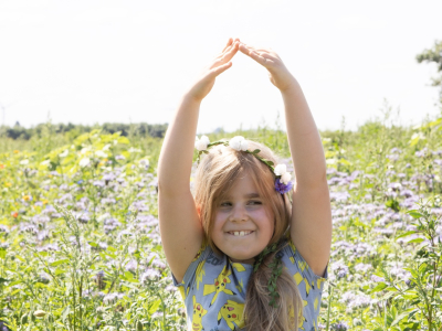 Girl in wildflowers at LDF